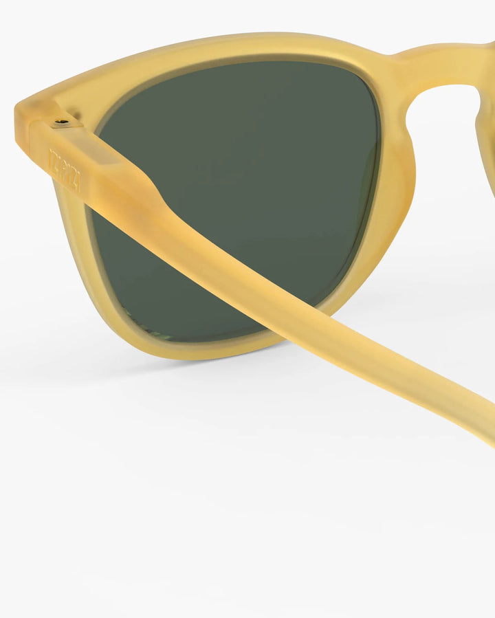 IZIPIZI CHILD #E Yellow Honey polarized kids sunglasses with translucent yellow frame and green polarized lenses