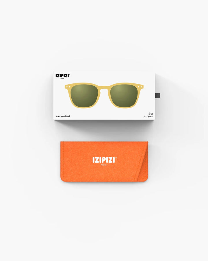 IZIPIZI CHILD #E Yellow Honey polarized kids sunglasses with translucent yellow frame and green polarized lenses