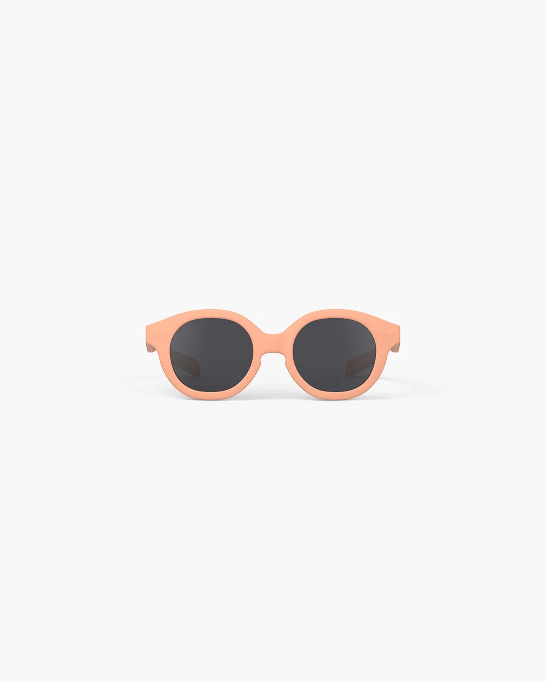 IZIPIZI Baby #C Apricot polarized sunglasses for children aged 0–3 years with matte peach frame and grey lenses
