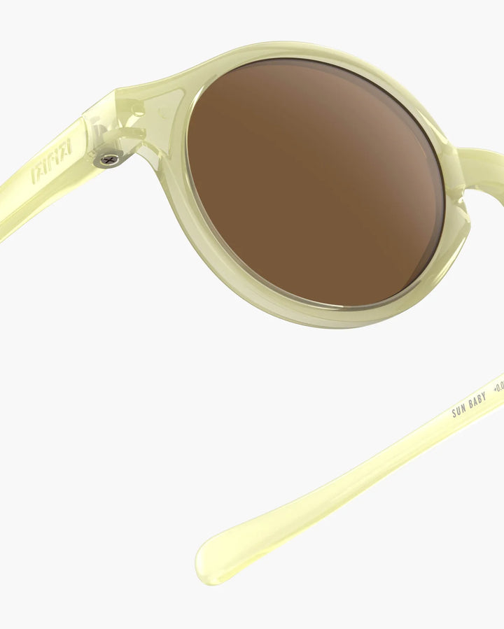 IZIPIZI BABY #D Vanilla polarized baby sunglasses with shiny pale yellow frame, grey-green lenses and 100% UV protection