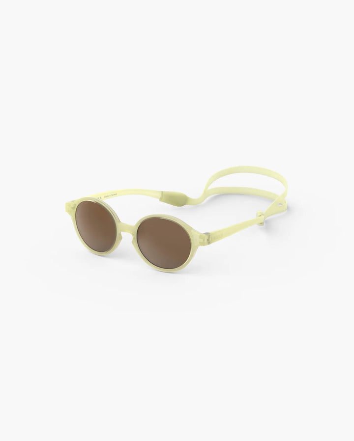 IZIPIZI BABY #D Vanilla polarized baby sunglasses with shiny pale yellow frame, grey-green lenses and 100% UV protection