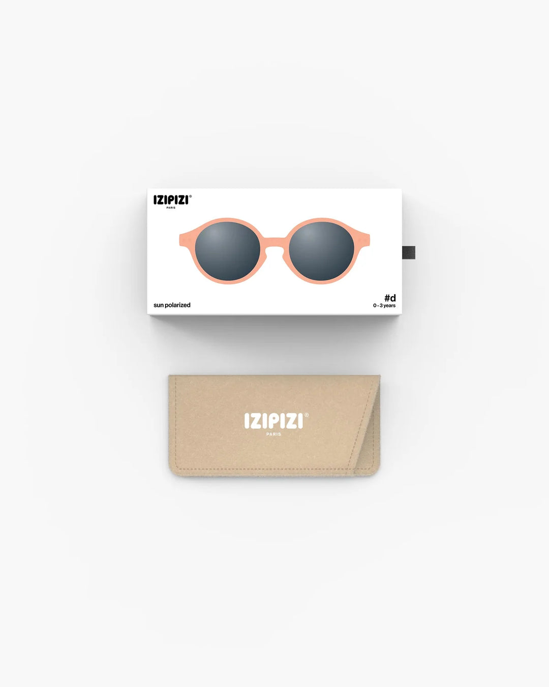 IZIPIZI Baby #D Apricot polarized sunglasses for toddlers aged 0–3 with a soft peach matte frame and grey lenses