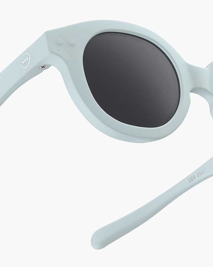 IZIPIZI Baby #C Sweet Blue polarized sunglasses for children aged 0–3 with a soft pastel blue frame and grey lenses