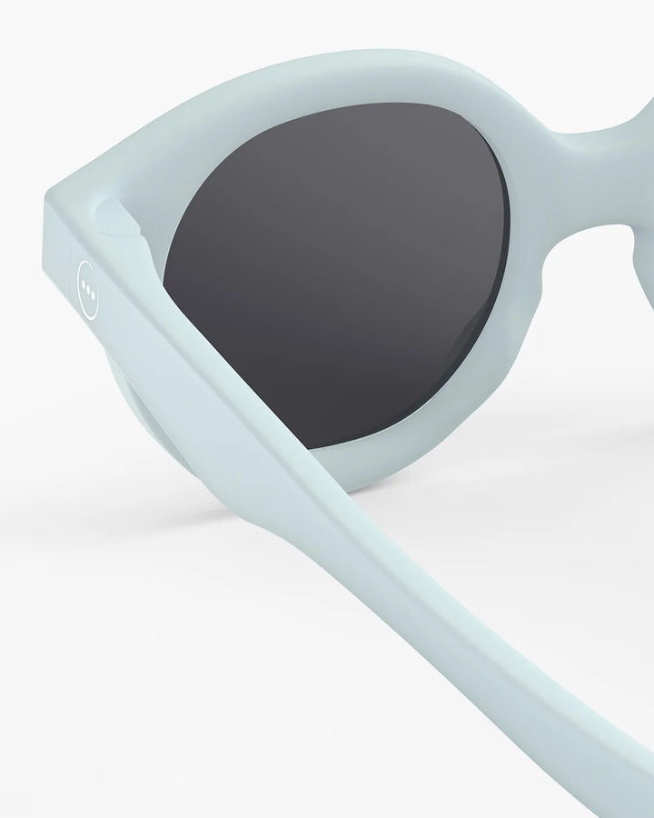 IZIPIZI Baby #C Sweet Blue polarized sunglasses for children aged 0–3 with a soft pastel blue frame and grey lenses