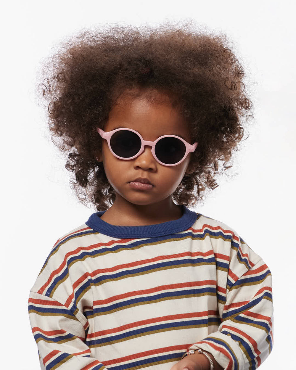 IZIPIZI Baby #D Pastel Pink polarized sunglasses for toddlers aged 0–3 with a soft matte pink frame and grey lenses