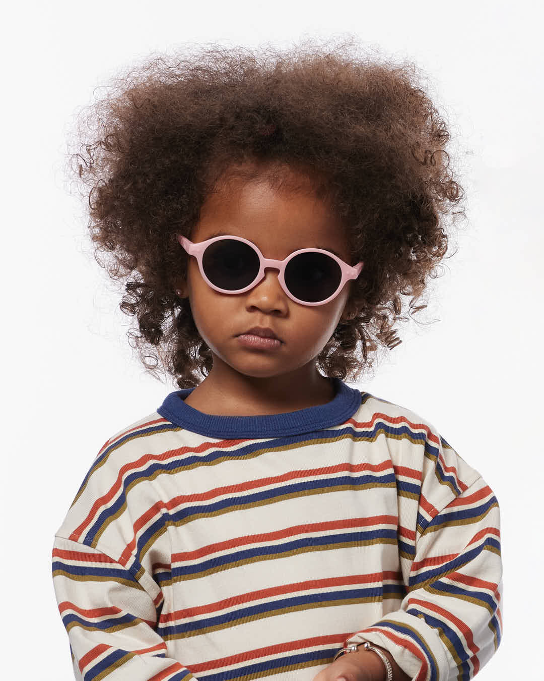 IZIPIZI Baby #D Pastel Pink polarized sunglasses for toddlers aged 0–3 with a soft matte pink frame and grey lenses