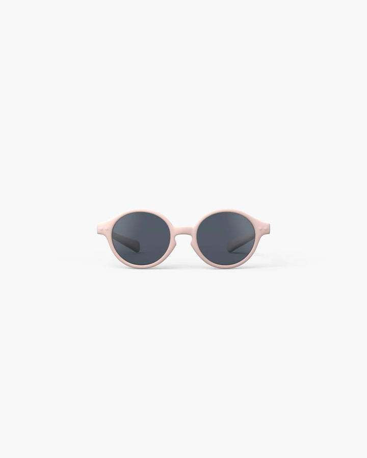 IZIPIZI Baby #D Pastel Pink polarized sunglasses for toddlers aged 0–3 with a soft matte pink frame and grey lenses