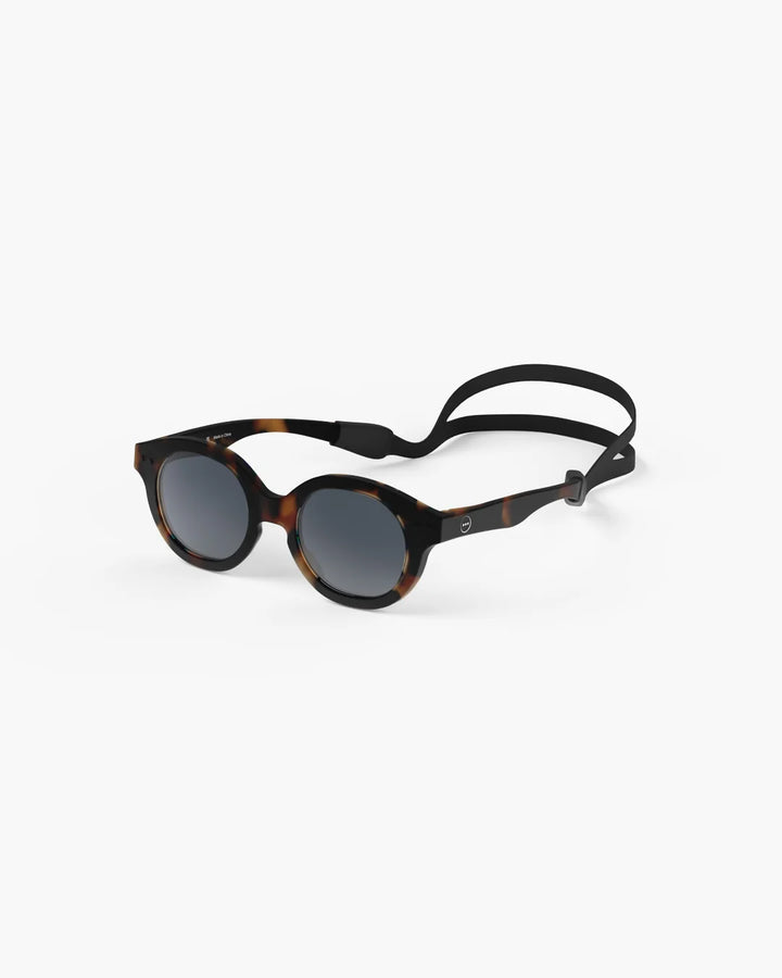 IZIPIZI Baby #C Tortoise polarized sunglasses for children aged 0–3 with warm brown tortoiseshell frame and grey lenses