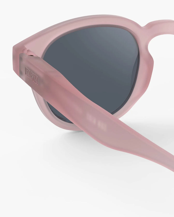 IZIPIZI CHILD #C Pink polarized kids sunglasses with soft-touch pale pink frame, grey-green lenses and 100% UV protection