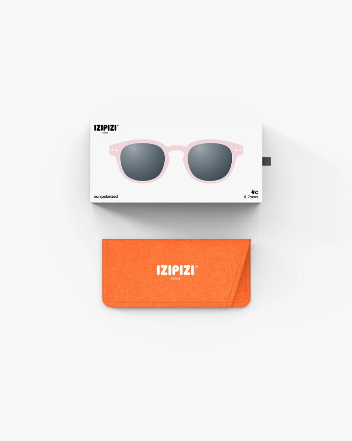 IZIPIZI CHILD #C Pink polarized kids sunglasses with soft-touch pale pink frame, grey-green lenses and 100% UV protection