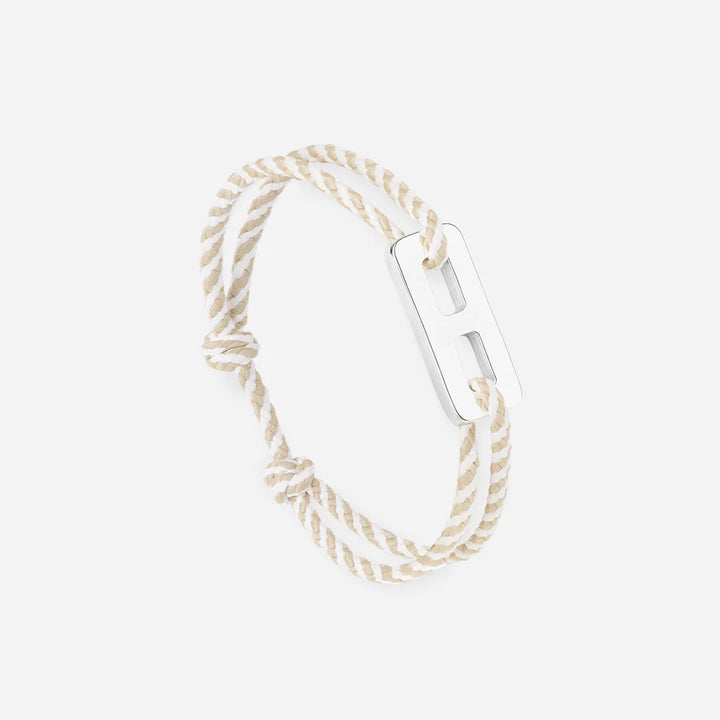 Le Vent à la Française Véora bracelet with beige and white cord and silver buckle
