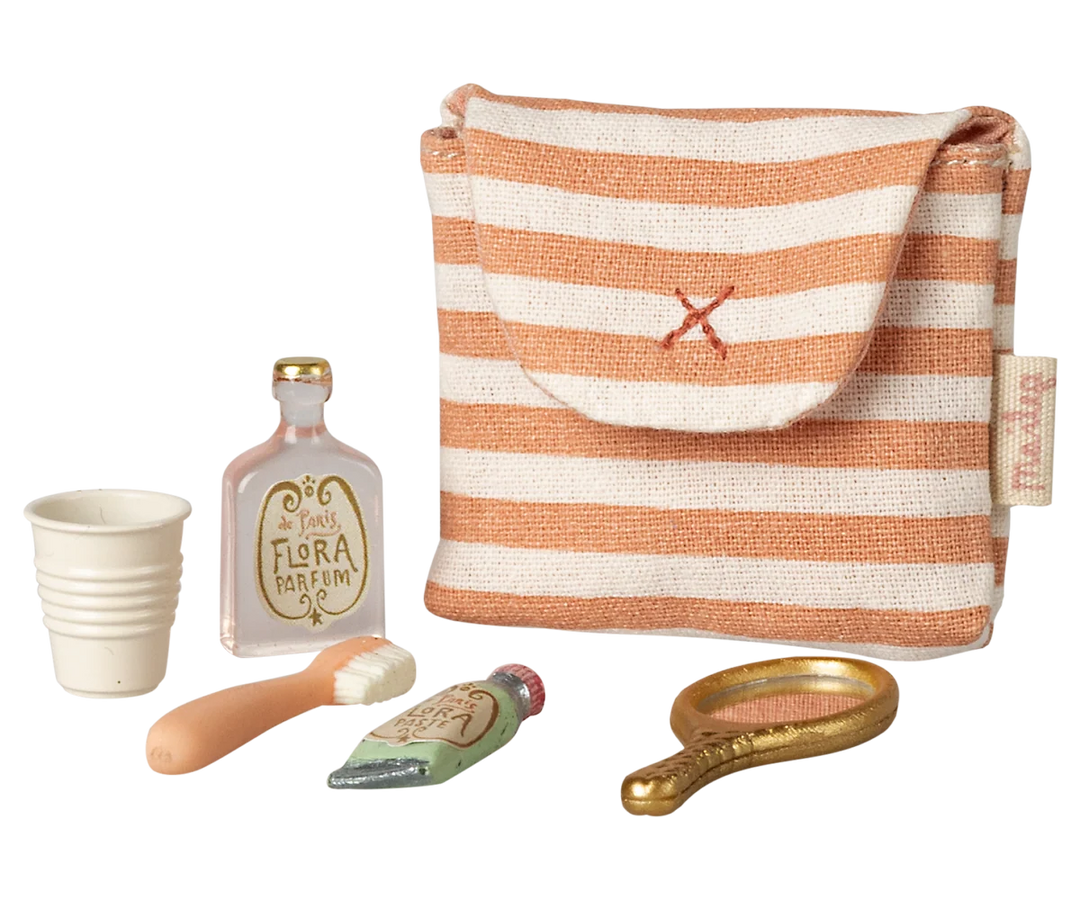 Maileg mouse toothbrush set in coral striped bag with miniature toothbrush, cup, mirror, cream and perfume bottle