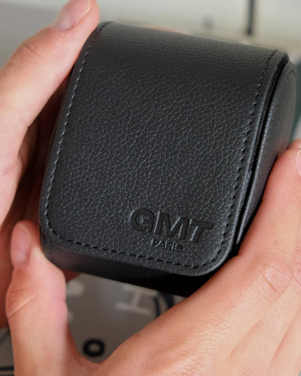 Black single watch travel box with padded interior by Maison Scarlett