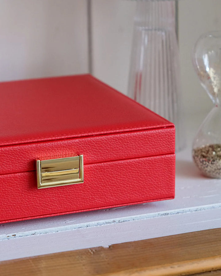 Red leather jewelry box with gold clasp by Maison Scarlett