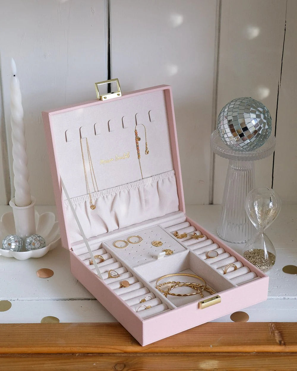 Pink leather jewelry box with gold clasp by Maison Scarlett