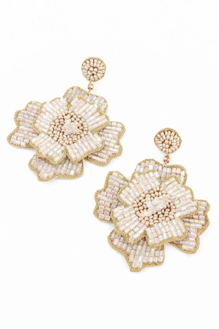 Handcrafted white flower statement earrings with intricate glass bead detailing