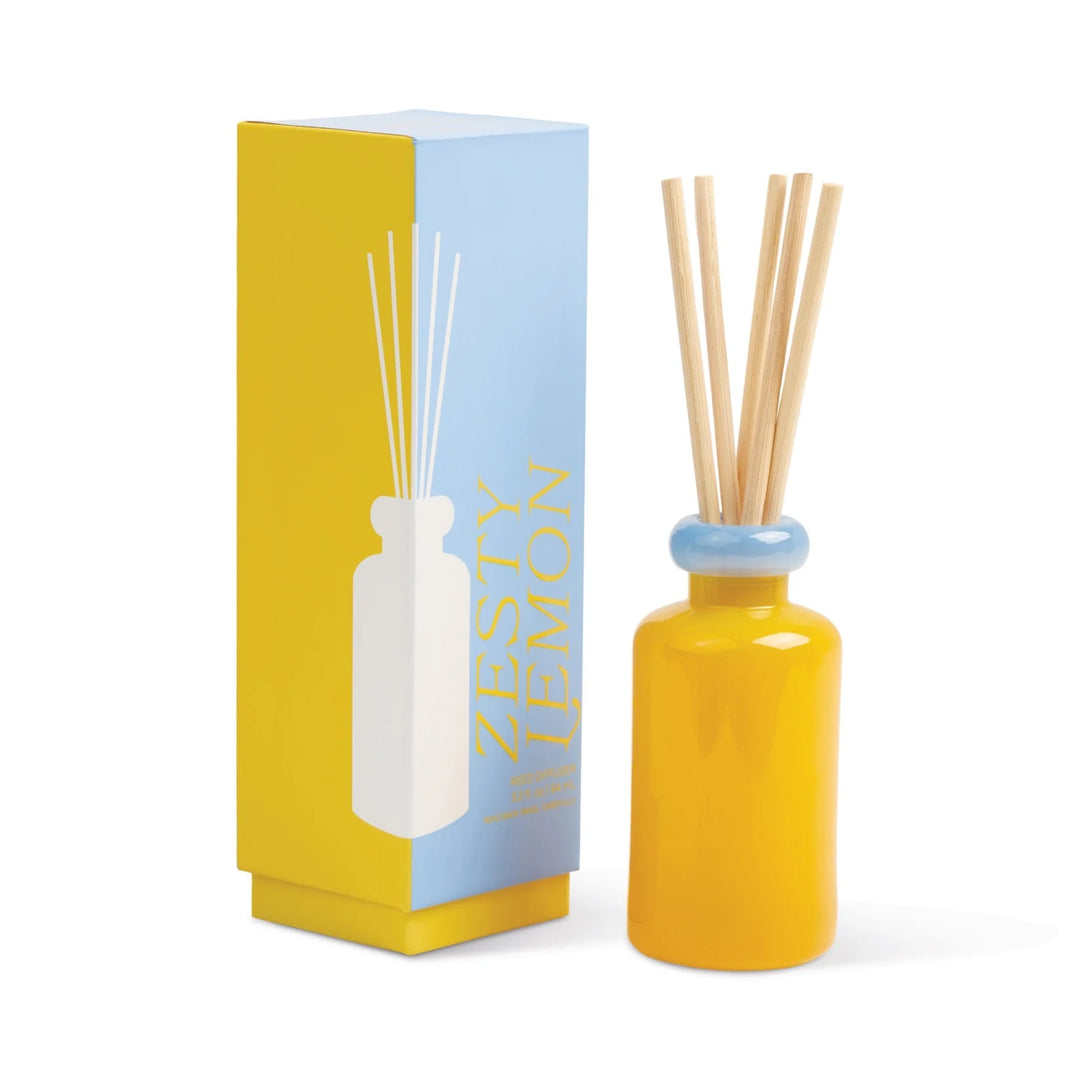 Colorful stack glass reed diffuser with dual tone bottle and natural reeds
