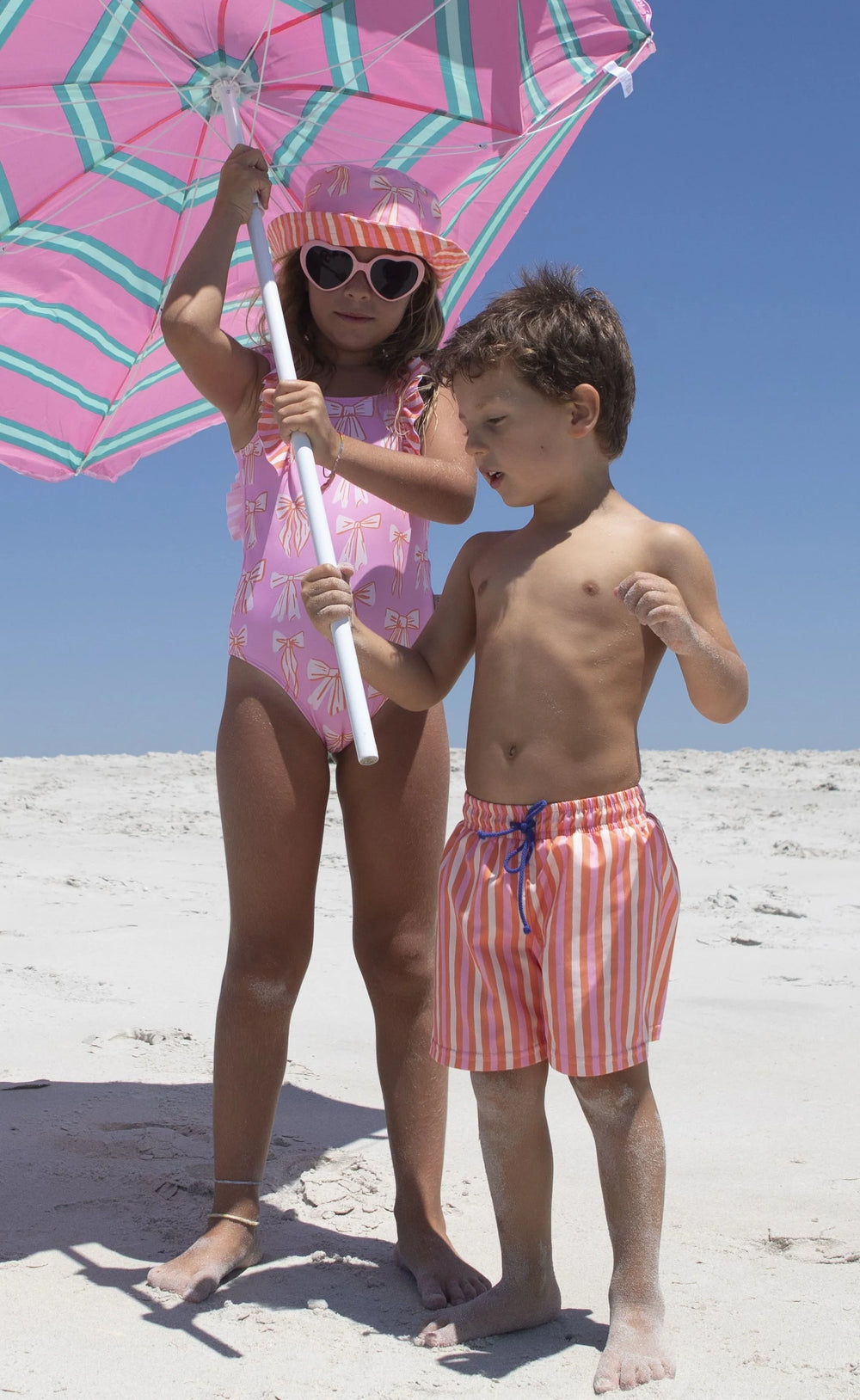 boys striped swim shorts orange pink beach
