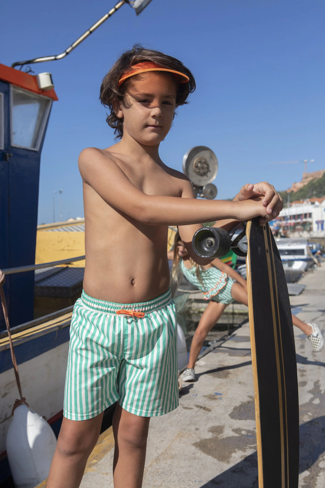 boys green striped swim shorts elastic waistband
