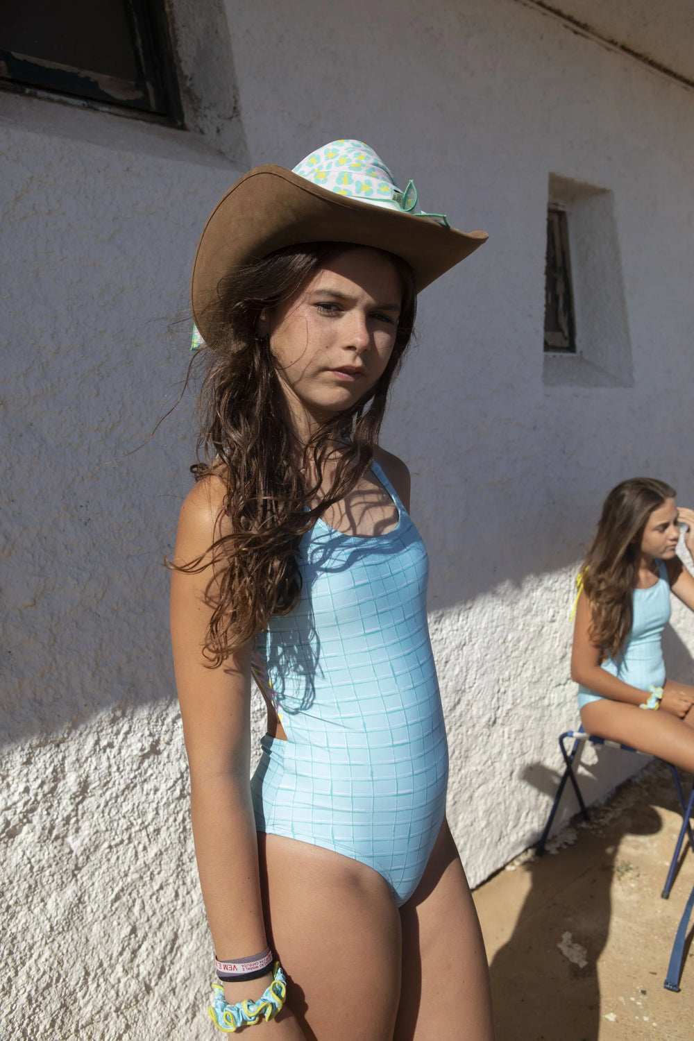 girls aqua one piece swimsuit open back grid print pastel dots
