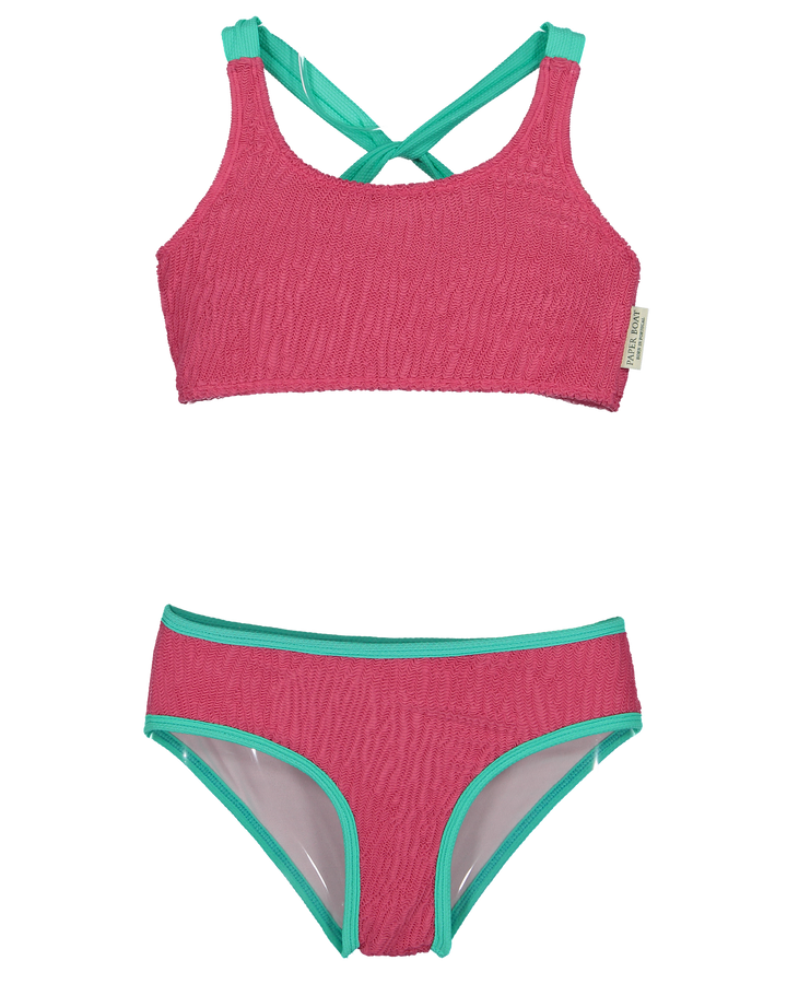 girls pink textured bikini set with green straps
