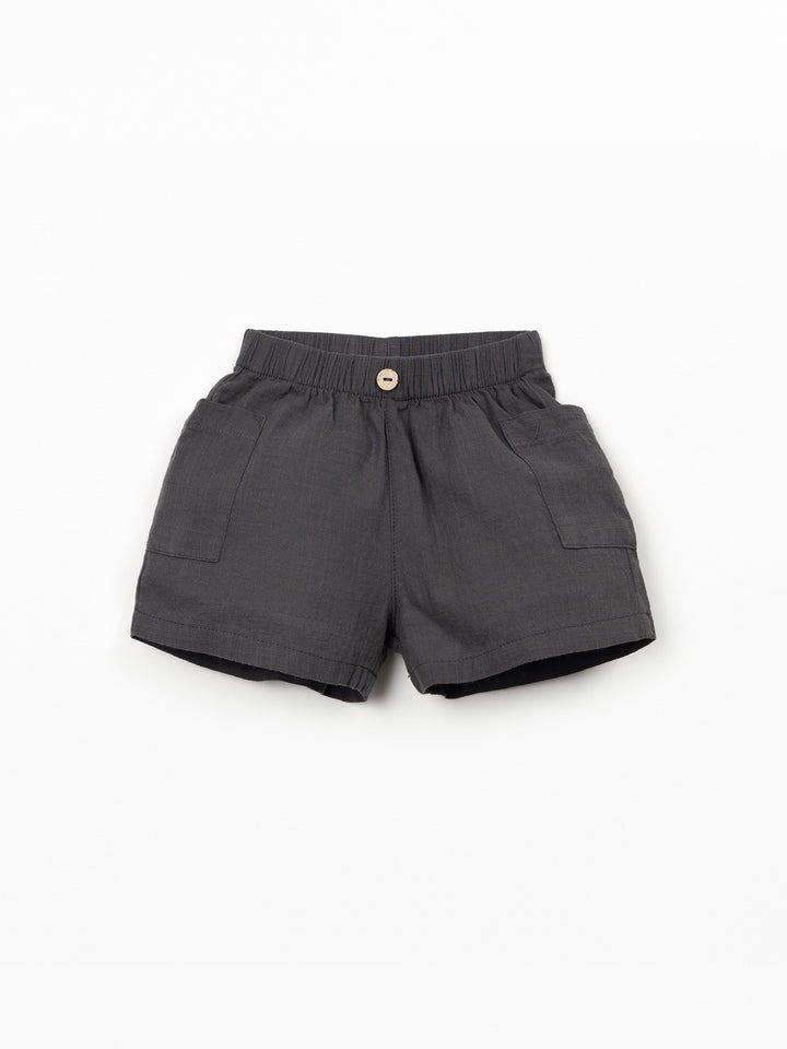 Organic cotton baby boy shorts in charcoal grey with elastic waistband and patch pockets