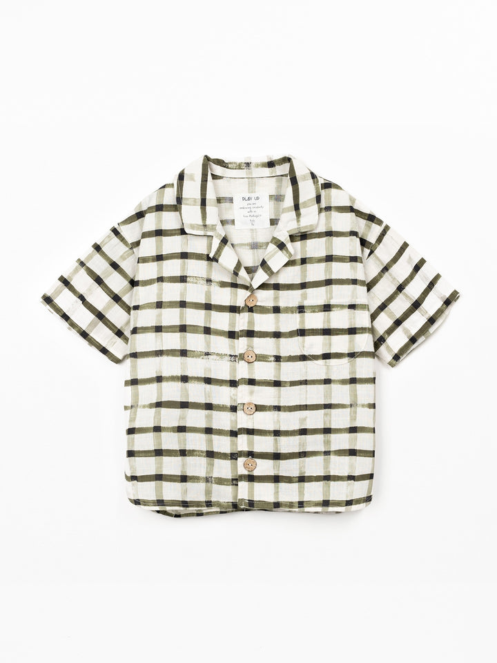Boy wearing check organic cotton shirt with short sleeves by Play Up