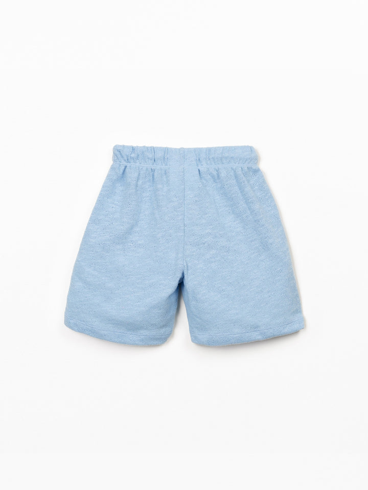 Boy organic cotton light blue shorts with elastic waistband and relaxed fit