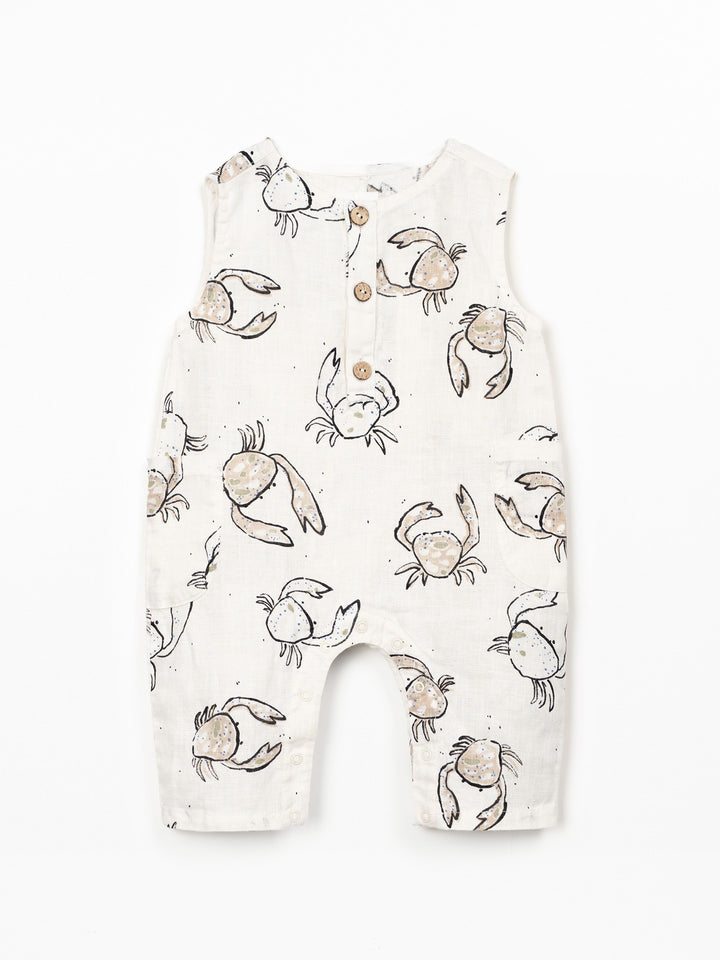 Baby linen romper with crab print and wooden buttons in soft natural tones