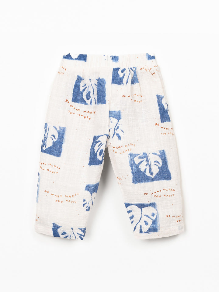Organic cotton boys trousers with blue tropical leaf print and relaxed fit