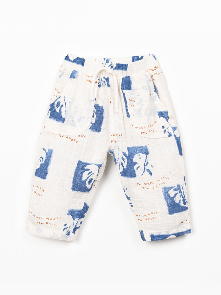 Organic cotton boys trousers with blue tropical leaf print and relaxed fit