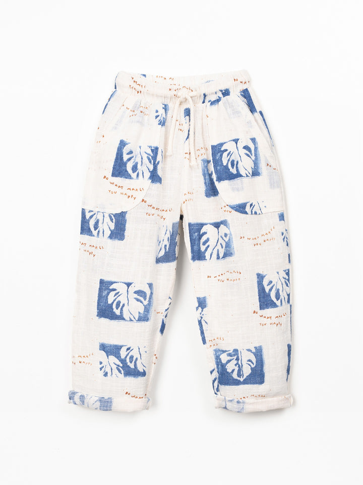 Organic cotton boys trousers with blue tropical leaf print and relaxed fit