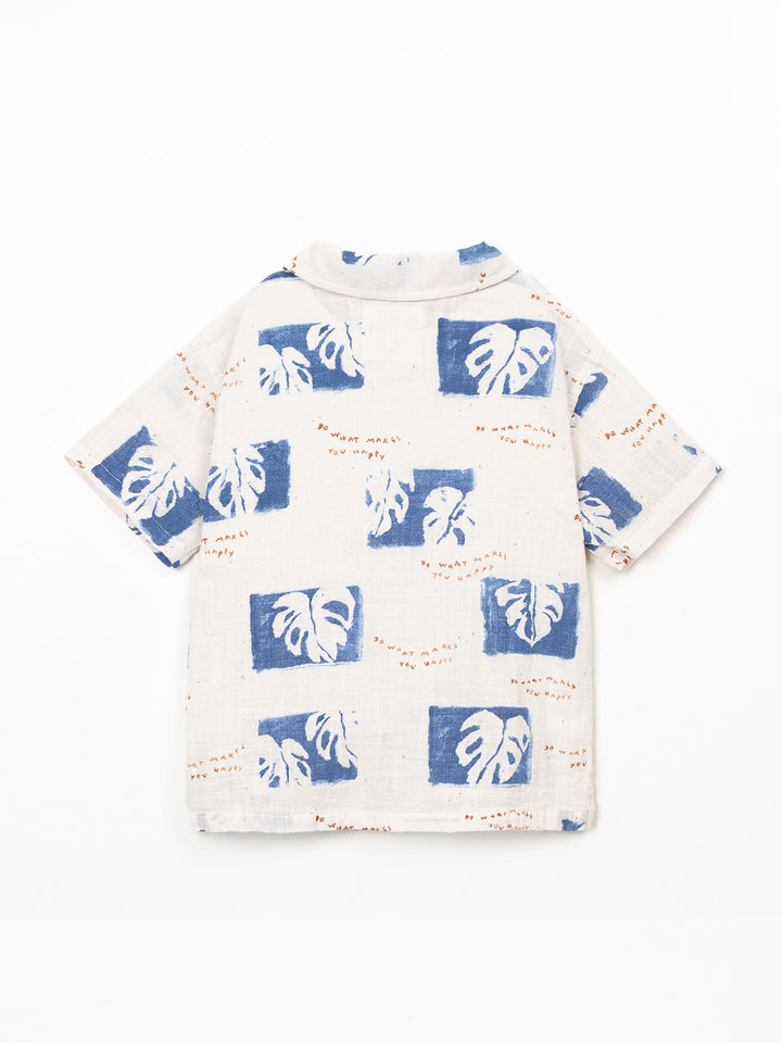 Boy’s organic cotton printed shirt with blue botanical pattern by Play Up