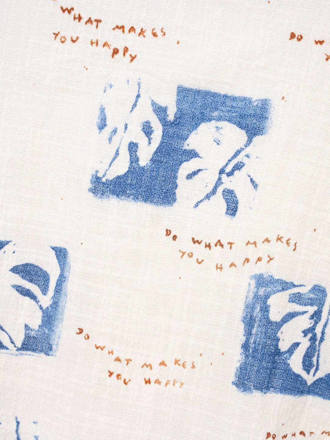 Boy’s organic cotton printed shirt with blue botanical pattern by Play Up