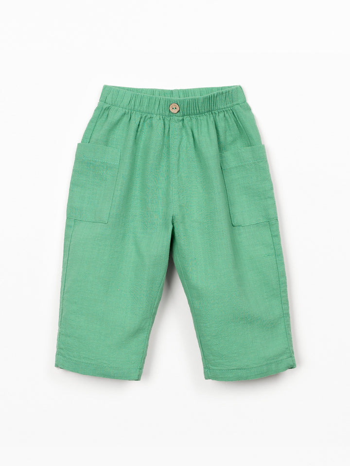 Organic cotton baby boy trousers in soft mint green with patch pockets and elastic waistband