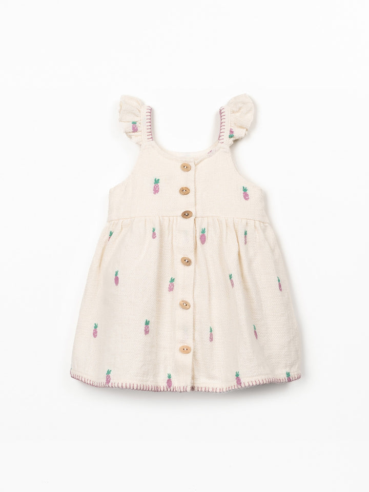 Baby girl pineapple print dress in textured cream cotton with flutter sleeves and wooden buttons