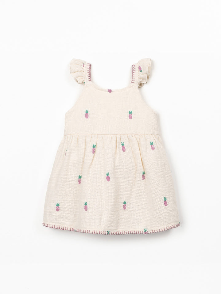 Baby girl pineapple print dress in textured cream cotton with flutter sleeves and wooden buttons