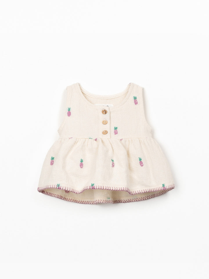 Baby girl textured pineapple print top in soft cream cotton with wooden buttons