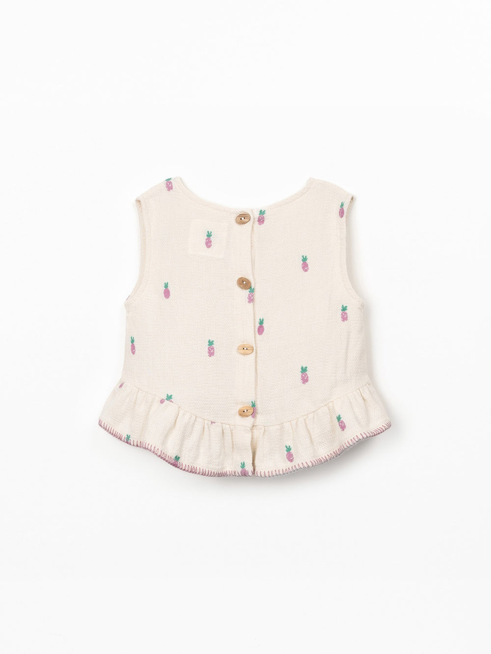 Girls textured cotton pineapple print top with ruffle hem in soft cream fabric