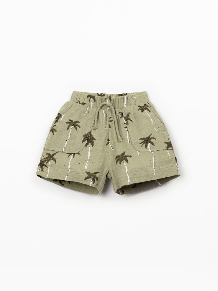 Organic cotton palm tree print shorts in soft sage green with elastic waistband
