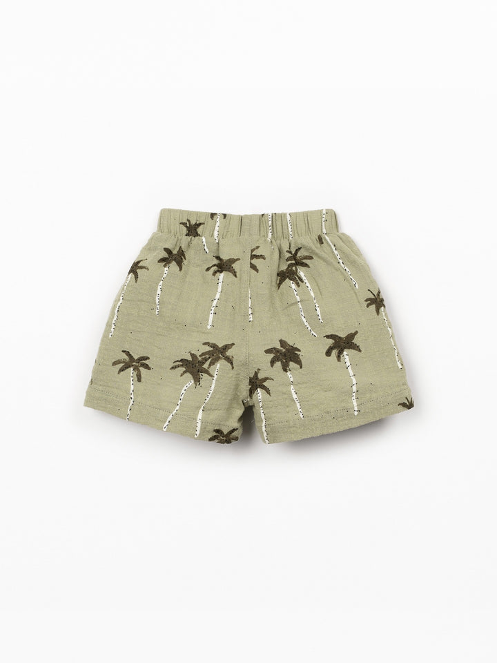 Organic cotton palm tree print shorts in soft sage green with elastic waistband