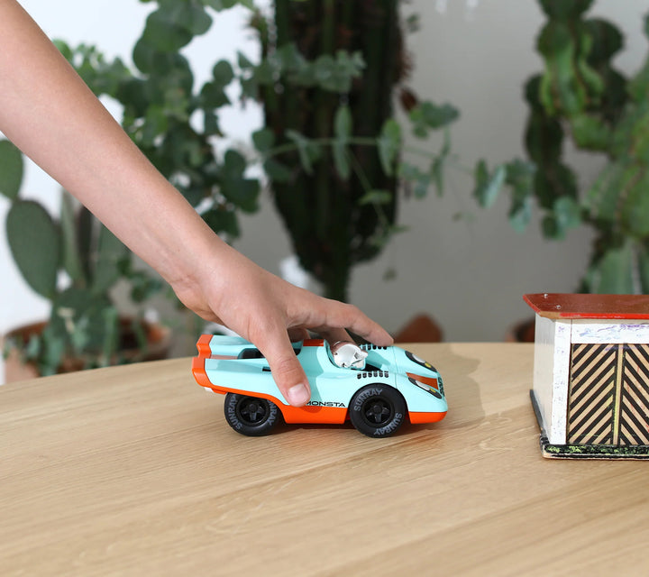 Playforever Zemonsta Klaus designer toy car with blue and orange racing-inspired finish