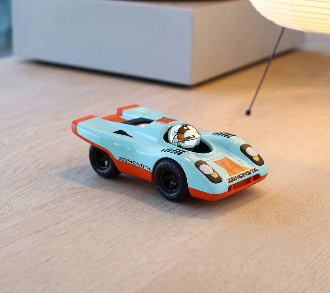 Playforever Zemonsta Klaus designer toy car with blue and orange racing-inspired finish