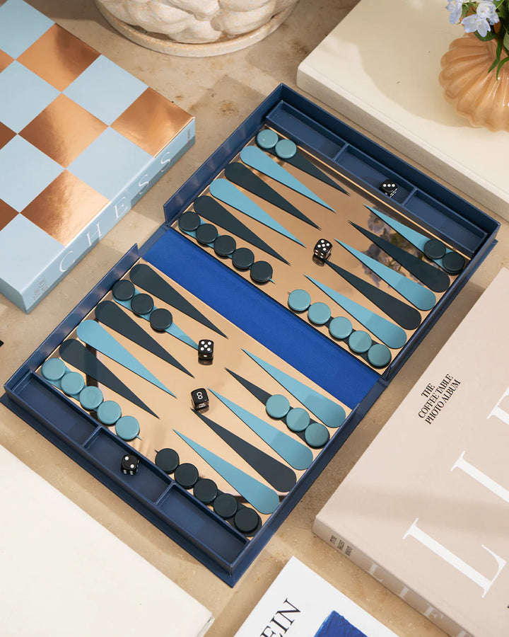 Art of Backgammon Mirror board game in dark blue and copper with mirrored playing surface and decorative coffee table design