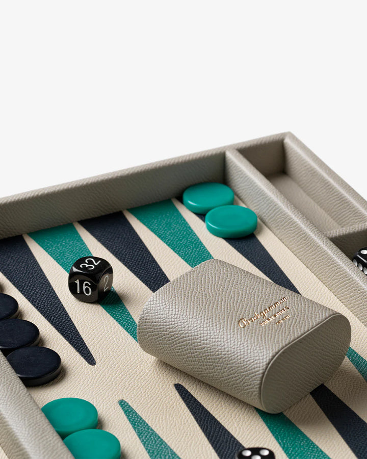 Backgammon Reverra board game with faux leather case, modern playing field and premium coffee table design