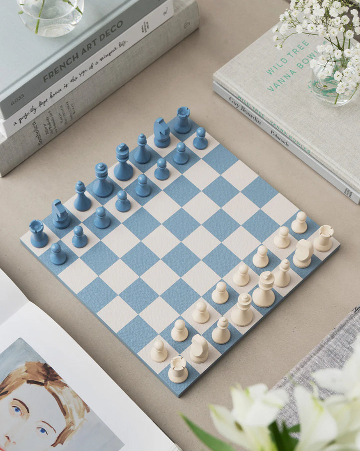 Chess Reverra luxury chess set with blue and cream checkerboard design and premium faux leather storage case