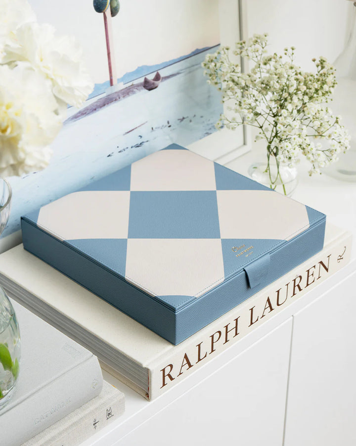 Chess Reverra luxury chess set with blue and cream checkerboard design and premium faux leather storage case