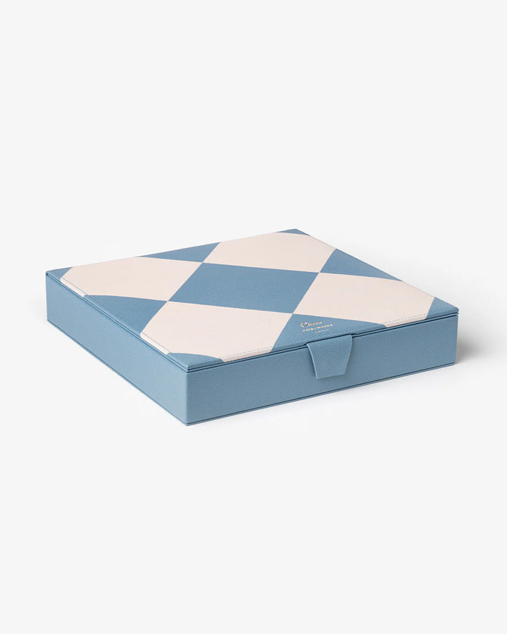 Chess Reverra luxury chess set with blue and cream checkerboard design and premium faux leather storage case