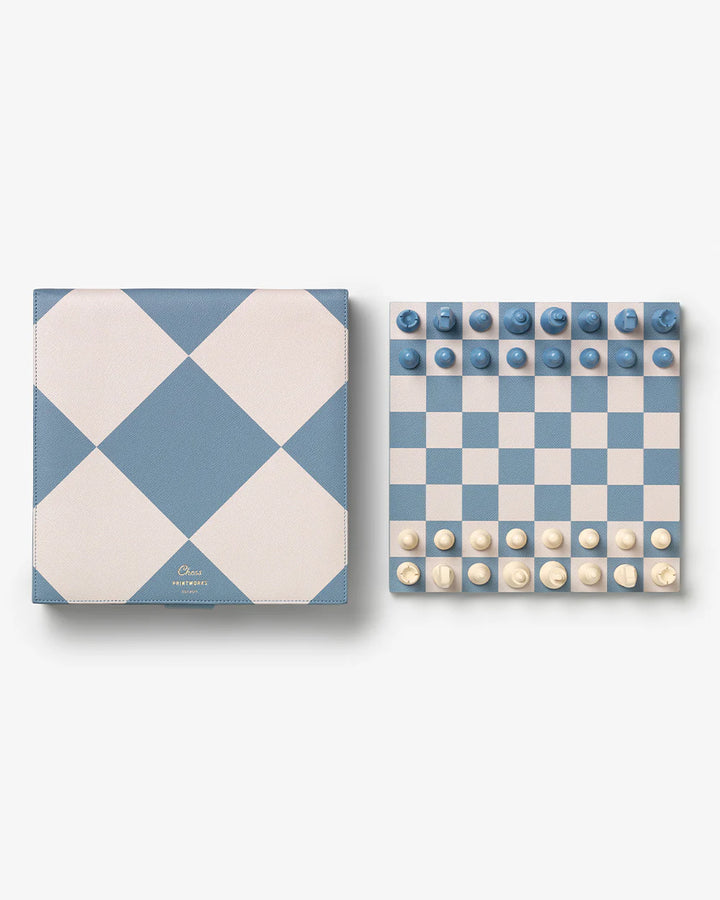 Chess Reverra luxury chess set with blue and cream checkerboard design and premium faux leather storage case