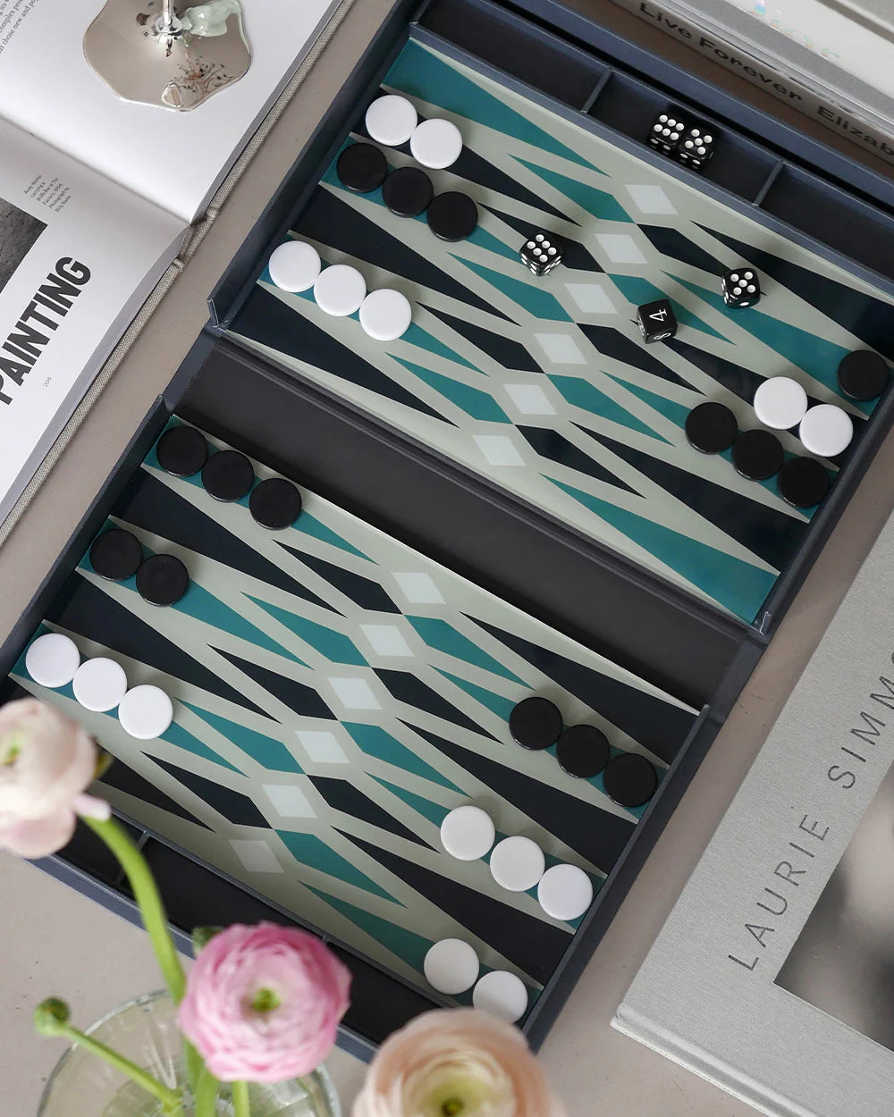 Classic backgammon set in book-style storage box with elegant black and blue design for family game nights and home décor